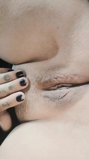 Secretary touches her vagina with her finger