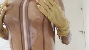 latex rubber transparent catsuit and hood and gloves but plug cum