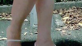 Crossdresser plays with butt plug in parking lot - intimate moment