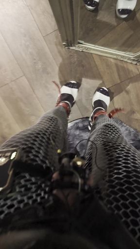 Sexy latex babe in high heels with chastity belt