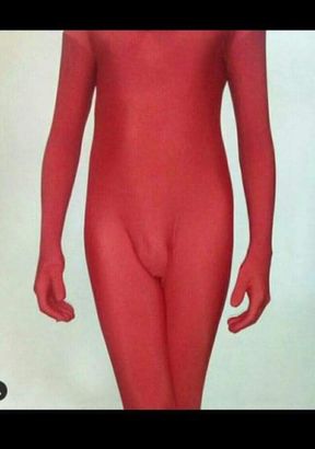 Having fun at home wearing a red zentai suit. I love it !