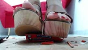 crushing a Metal London Bus with 2 pair of sandals heels