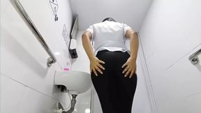 Amateur camera in hospital bathroom records Latina nurse