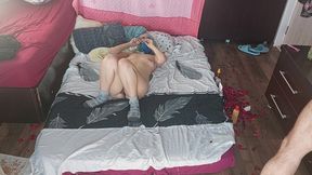 Sensual massage of a hot couple with oil on the body. Foreplay in the bedroom with an amateur couple.