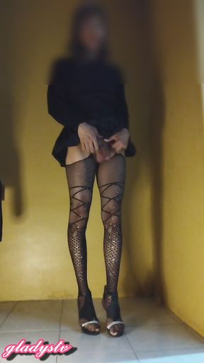 Shemale masturbating with pantyhose and high heels