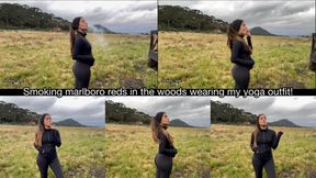 Smoking marlboro reds in the woods wearing my yoga outfit!