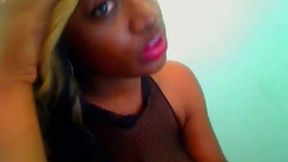 Exquisite black bimbo shows off her enormous tits on webcam