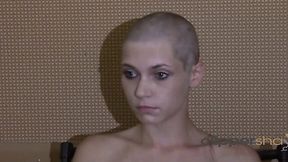 Bald bombshell goes all the way