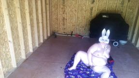 Bunny masturbates in the shed