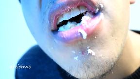 Eating cake with his mouth
