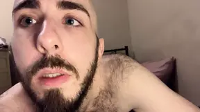 Bald blue-eyed white guy with uncut dick strips down on the bed to reveal very hairy skinny body