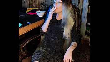 adult stepdaughter smokes a cigarette