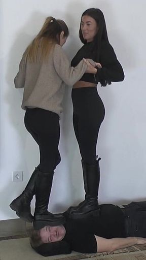 Olga and Natasa Love to Trample the Slave in Boots