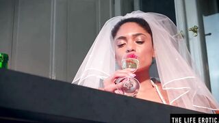 African bride wears her veil while she fucks herself with a bottle