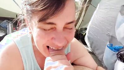 Short-haired mature woman filmed POV-style while sucking cock