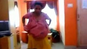 Cute and all natural dark haired Indian chick puts on her sari