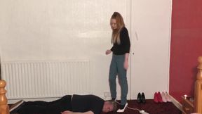 High-heeled Babe Dances And Tramples Slaves Head