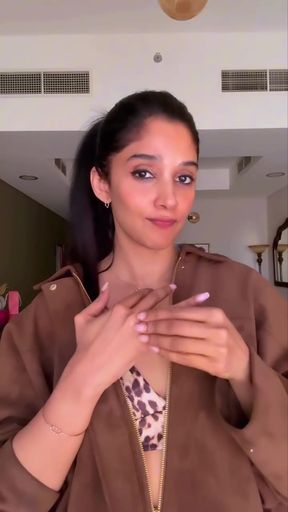 Indian woman in brown jacket