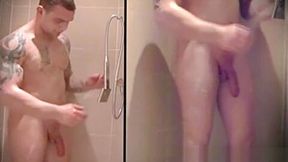 Muscly guy in tats showering