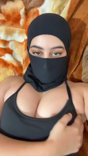 Horny Arab girl in hijab plays with soft tits Muslim solo boob closeup