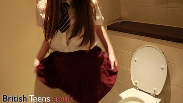 College Student Taking A Piss on the Toilet