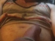 Stroking wearing cockrings.