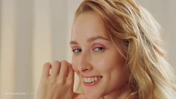 Kelly Collins' Sultry Solo: Blonde Bombshell Teasing Herself in Lingerie