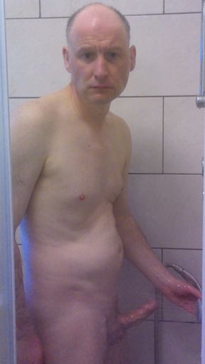 British man wanking in the shower getting horny then rubbing himself dry with a towel   Clip 2