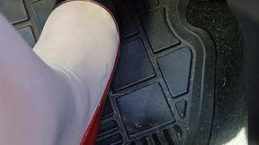 I go for a drive in my old car! I start out wearing my Louboutin pumps and tan nylons, but after a minute of driving I kick my heels off and drive around in just my nylons!! I drive fast in this one!!