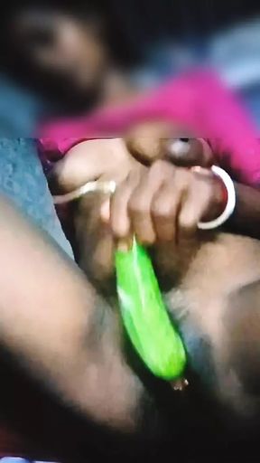 Asian house wife self satisfaction with brinjal and her pussy orgasm squirting her with brinjal