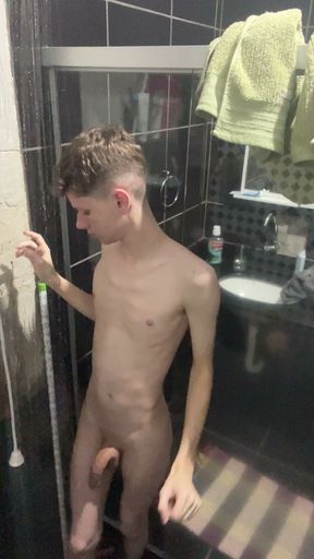 A Twink showing his body and naked at shower