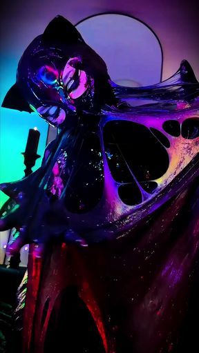 Slime-loving symbiote in a latex hood plays alone