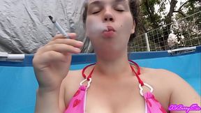 Smoking cigarette in my new bikini outside