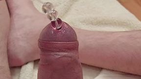 Beads string cock sounding into bladder