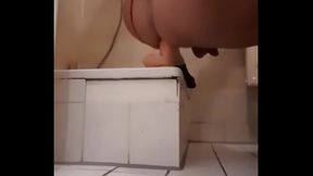 Hot guy in red tanga rides on dildo