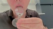 close-up cumshot into a glass eat it with a spoon and lick tje cum  up to the very last drop