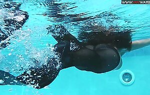 Hot teen Diana in fishnet stockings underwater