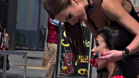 Kinky tattooed brunette sub gagged and humiliated by her domme in public