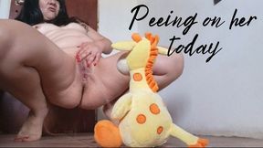 Peeing on her today