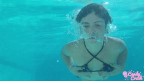 petite teen nude in the swimming pool