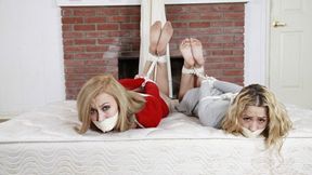 Bound Blondes! Alexa Grace and Goldie Cox Sit Tied and Gagged on a Mattress - Then They're Hogtied!