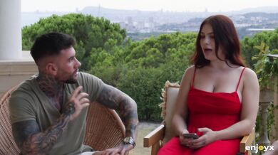 Busty redhead in lingerie sucks two guys raw and grips her big tits hard