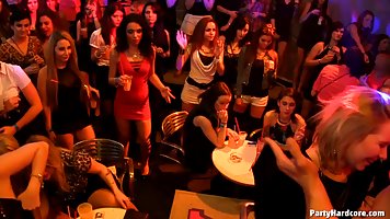 A group of horny girls is getting rounded up and banged during a live techno party