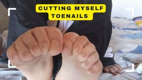Lola cuts her toenails