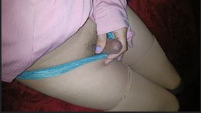 The effeminate man masturbates in sexy lingerie.