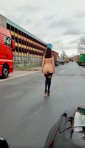 Naked Walk Between Trucks