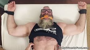 Bearded hairy hunk daddy Rick has his bare feet tickled