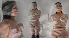 BREAST BOUND AND TIGHTLY TAPED TO A POLE