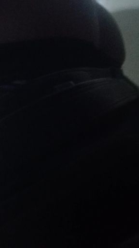 Showing her buttocks in a public bathroom