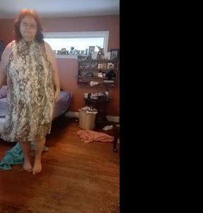 Dressing  in fluffy print dress from nude